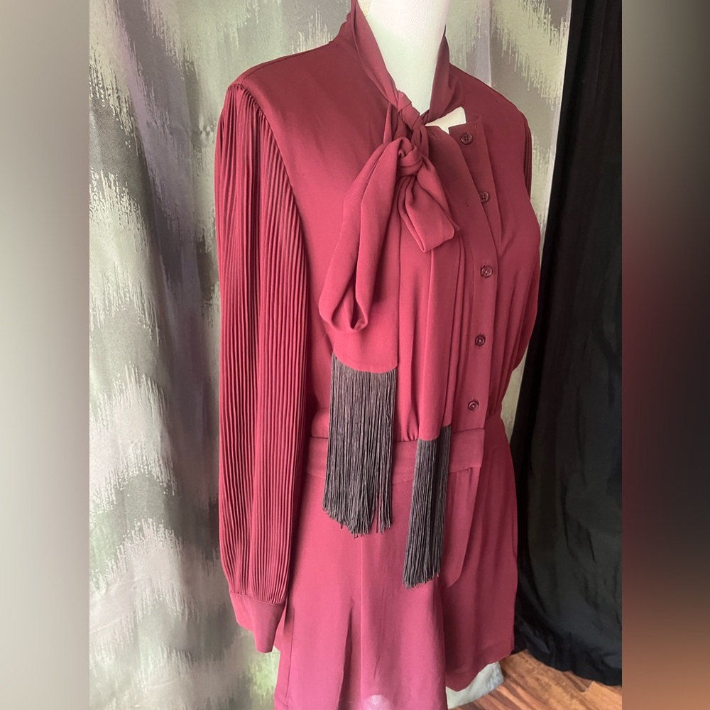 Michael Kors Beautiful burgundy color jumpsuit with cute design. Very cute S10